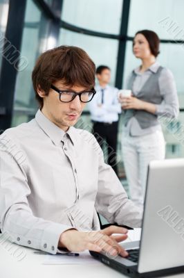 Closeup portrait of a handsome young man in a business suit. In 