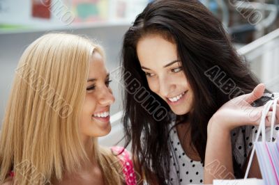 Group of beautiful shopping women with bags and smiling Group of beautiful shopping women with bags and smiling