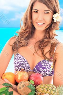 Closeup portrait of a beautiful cheerful woman with flower in he