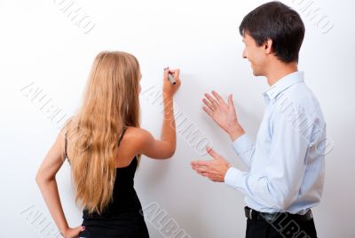 Closeup of adult teacher with student - explaining something