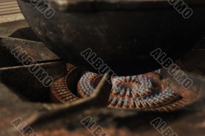 Closeup photo of old rusty gas stove