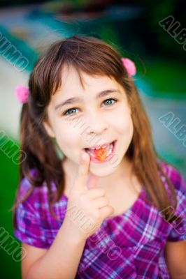 Artistic lifestyle photo of cute little girl outdoor at summer p