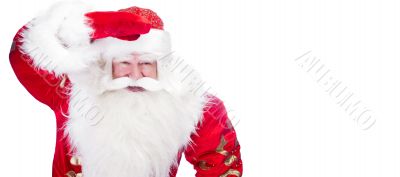 Traditional Santa Claus looking for children and holding his han