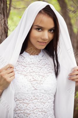 Closeup portrait of young brunette woman