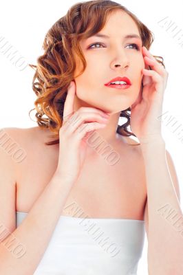 Young beautiful woman with long curly hairs - isolated on white