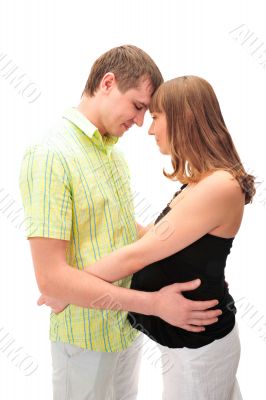 Image of pregnant woman touching her belly with hands