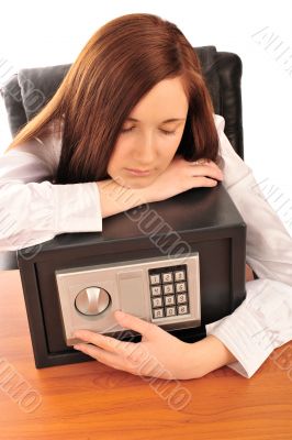 Closeup portrait of young pretty woman at her desk with deposit 