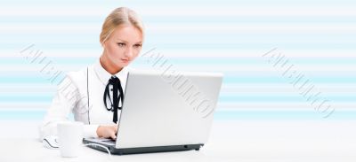 Portrait of a smiling beautiful young business woman working on 