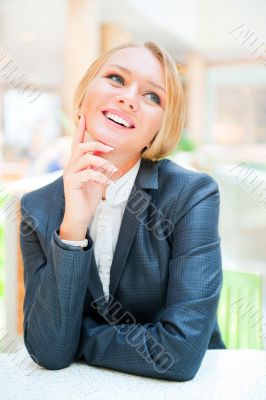 Portrait of a pretty businesswoman sitting at her desk