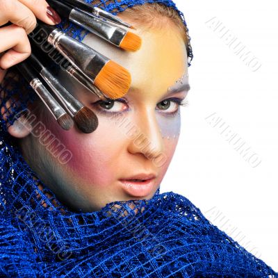 Portrait of a beautiful young women wearing a lot of makeup. Portrait of a beautiful young women wearing a lot of makeup.