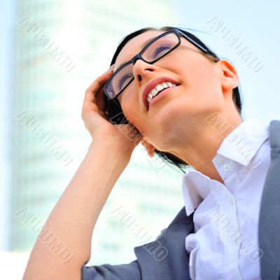 Closeup portrait of cute young business woman smiling