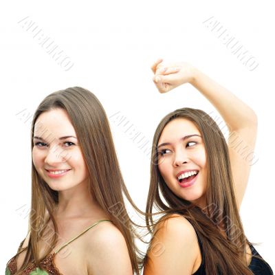 Two women dancing and smiling