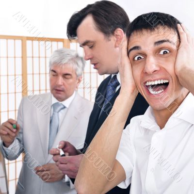 Portrait of a seminar and one man confused.