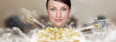 Portrait of young stylish modern woman watching movie at home an