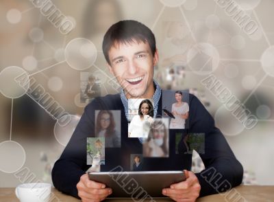 A businessman working on modern technology tablet computer and c