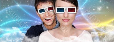 Portrait of young stylish modern couple wearing 3d glasses watch