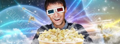 Portrait of young stylish modern man wearing 3d glasses watching