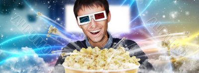 Portrait of young stylish modern man wearing 3d glasses watching