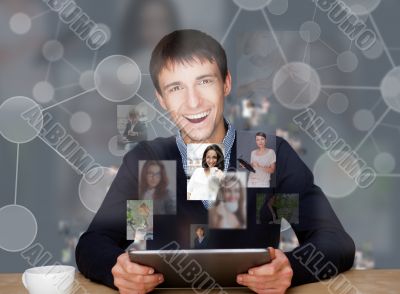 A businessman working on modern technology tablet computer and c