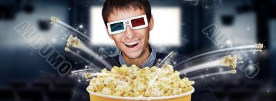 Portrait of young stylish modern man wearing 3d glasses watching