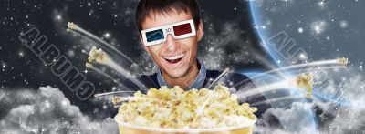Portrait of young stylish modern man wearing 3d glasses watching