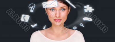 A businesswoman with icons floating around her head. Portrait of