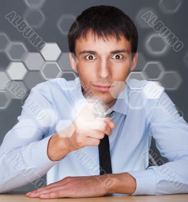 Business Man pressing digital button, futuristic technology