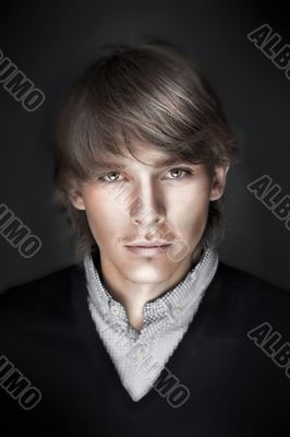 Portrait of young esquire man with smart and wise look. Looking Portrait of young esquire man with smart and wise look. Looking
