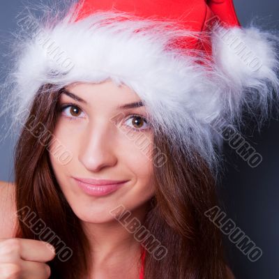20-25 years od beautiful woman in christmas dress. Closeup to he