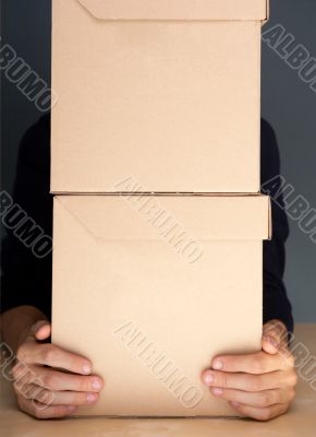 Successful Postal or delivery service concept. Man holding cardb