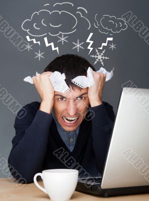 Closeup of a young angry business man having a stress. Headache. Closeup of a young angry business man having a stress. Headache.