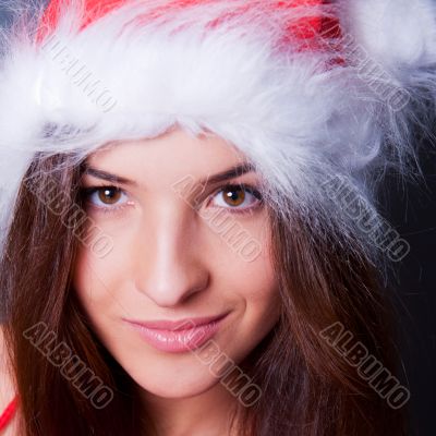 20-25 years od beautiful woman in christmas dress. Closeup to he
