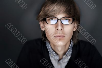 Portrait of young esquire man with smart and wise look. Looking 