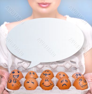 Portrait of young pretty business woman against grey background 