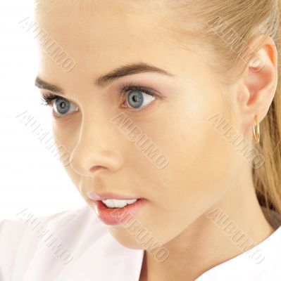 Smiling medical doctor woman. Isolated over white background