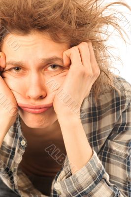 Portrait of funny young man with awesome hairdo isolated on whit