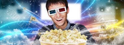 Portrait of young stylish modern man wearing 3d glasses watching