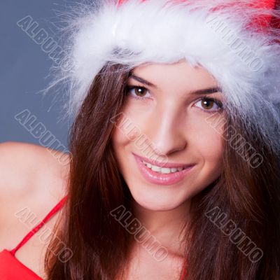 20-25 years od beautiful woman in christmas dress. Closeup to he