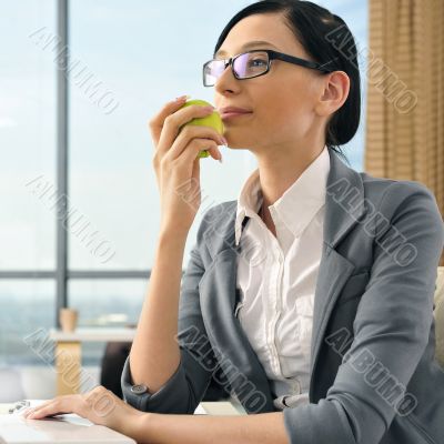 Portrait of a beautiful young businesswoman thinking.