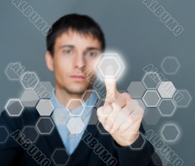 Business Man pressing digital button, futuristic technology