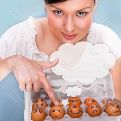 Portrait of young pretty business woman against grey background 