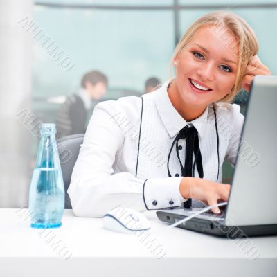 Face of beautiful woman on the background of business people