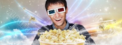 Portrait of young stylish modern man wearing 3d glasses watching