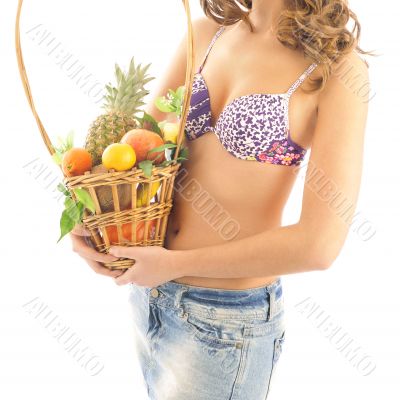 Portrait of young sexy tanned woman with flower in her hair hold