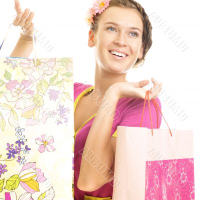 Portrait of lovely woman with shopping bags over white