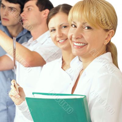 Portrait of a smart young female doctor standing in frount of he