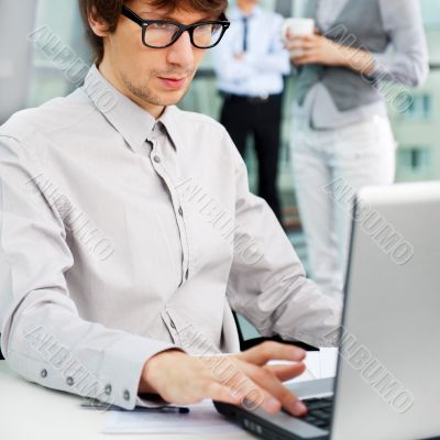 Closeup portrait of a handsome young man in a business suit. In 