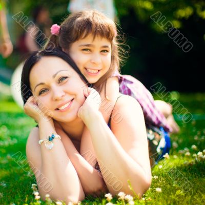 Artistic lifestyle photo happy family: adult woman and her daugh