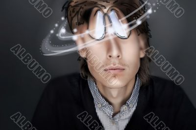 Young Business man against gray background. Distorted head and c