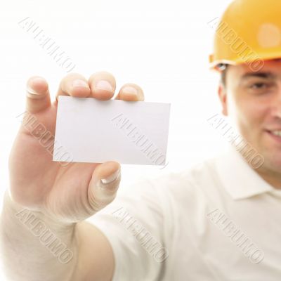 Closeup portrait of adult engineer man holding blank business ca